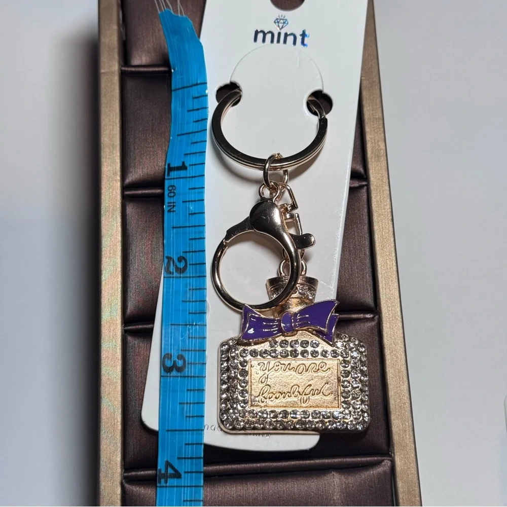 BAG CHARM MINT Bling Perfume Bottle Purple Enamel Bow Keychain You Are Beautiful